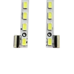 Detalle del kit de barras LED para LG 65LM6200, mostrando conectores y puntos de luz.