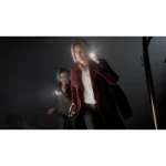 Imagen de Resident Evil 4 Remake con dos mujeres sosteniendo linternas en un ambiente oscuro y tenso